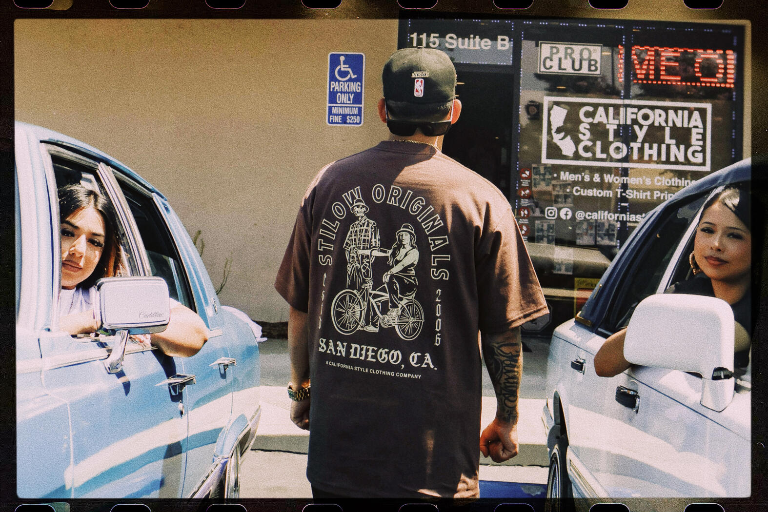 Siclow T-Shirt outside of California Style Clothing next to Diplomatics Car Club Lowriders